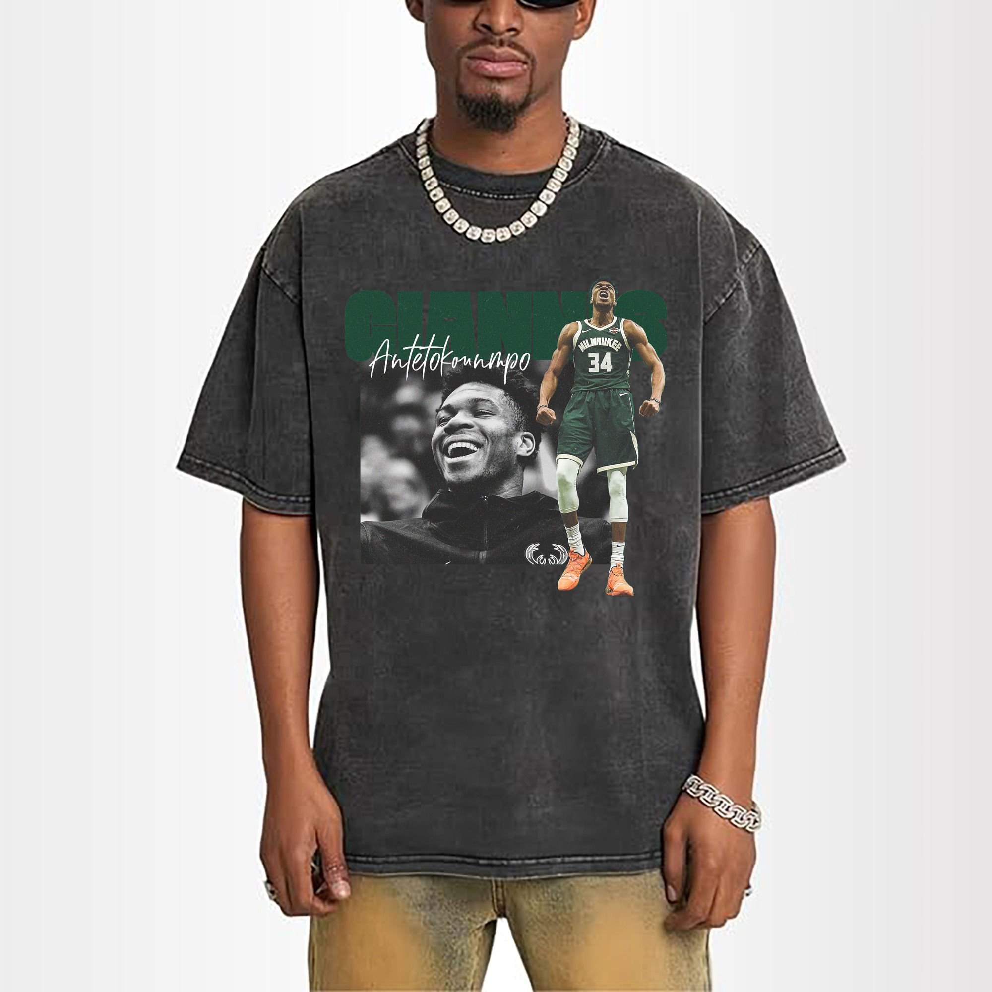 Giannis Antetokounmpo raises his arms to vent